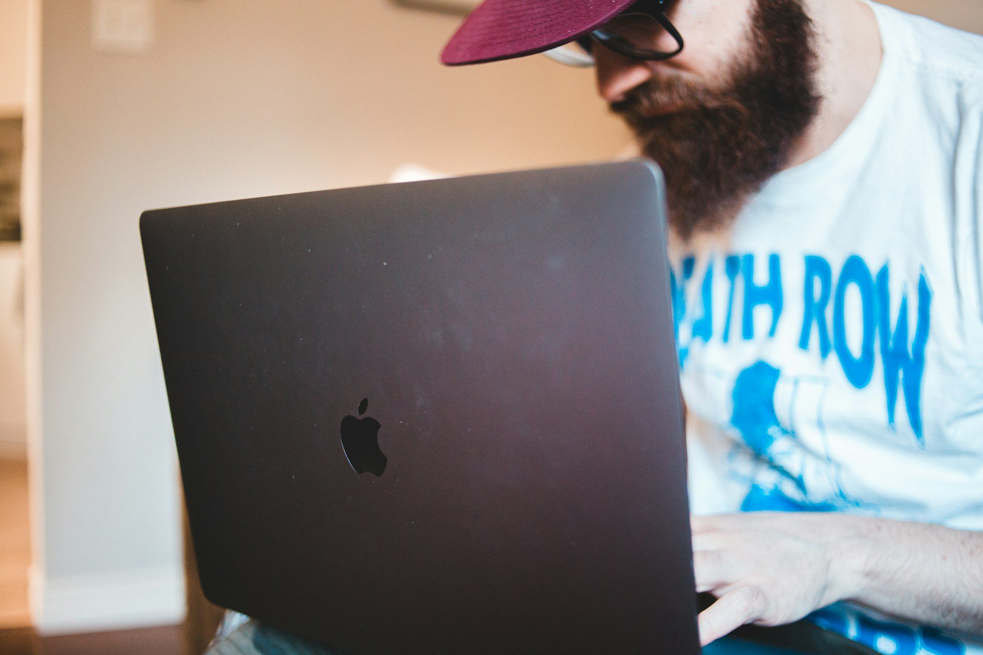 A person holding a laptop