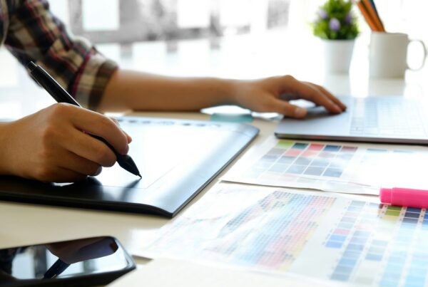 A person writing on a pad