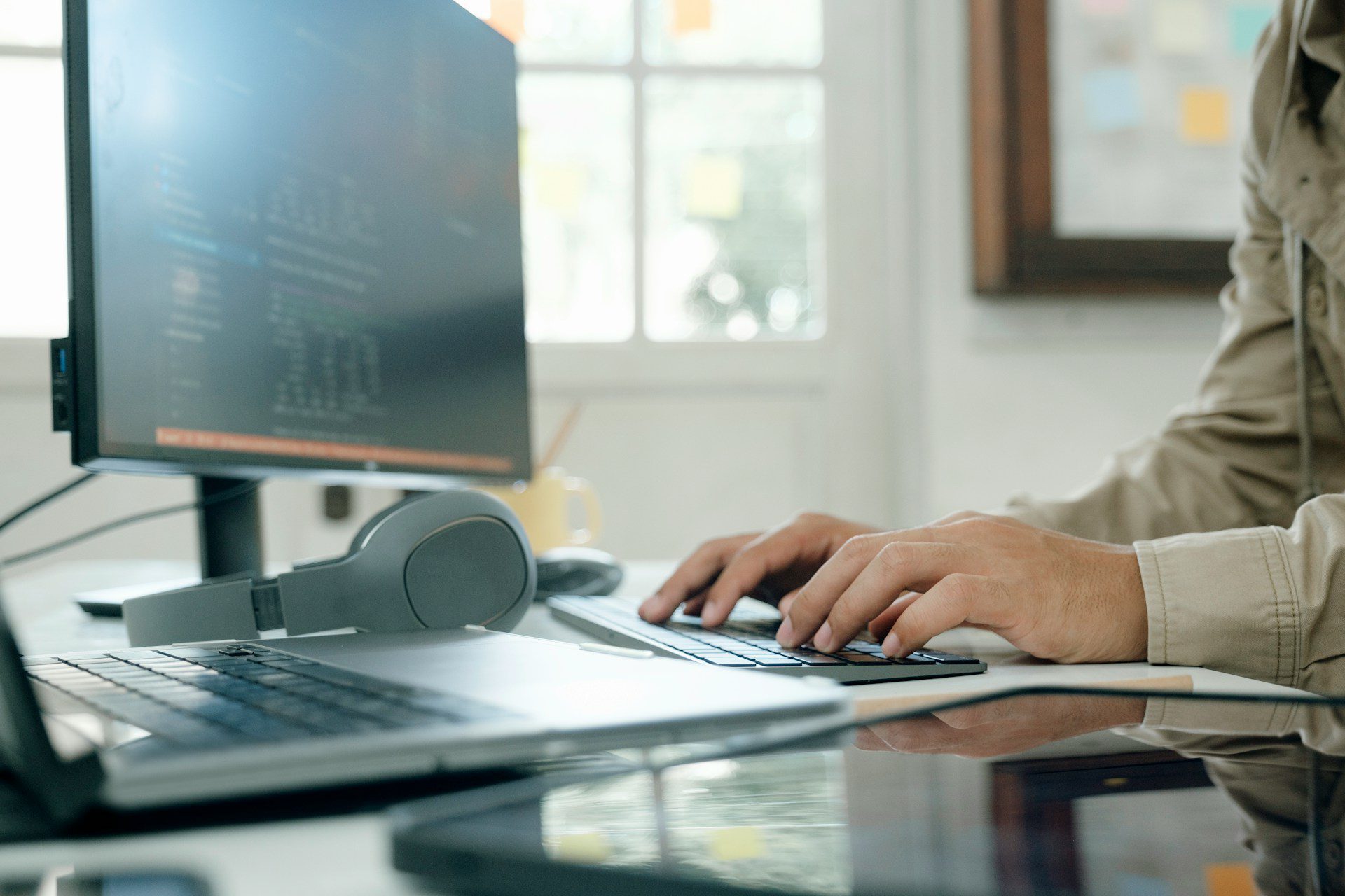 A person typing on a keyboard