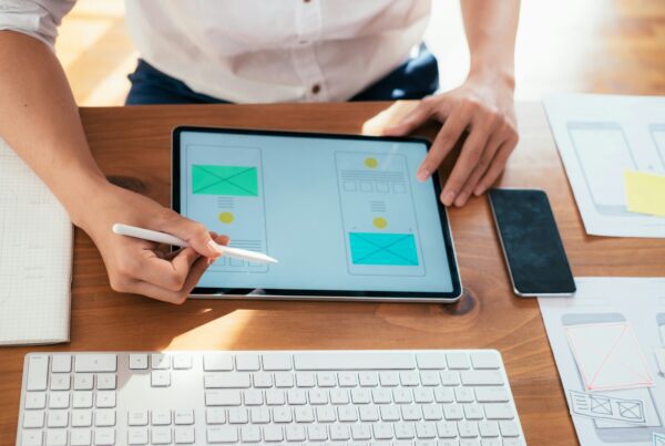 A person writing on a pad